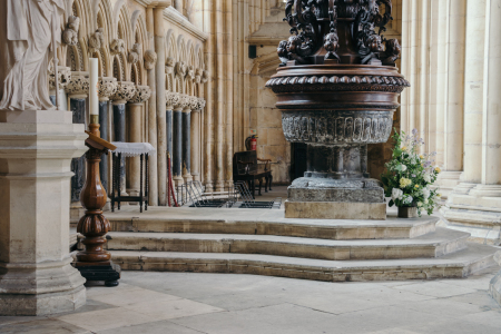 The Norman-era baptismal font inside Beverley Minster. 