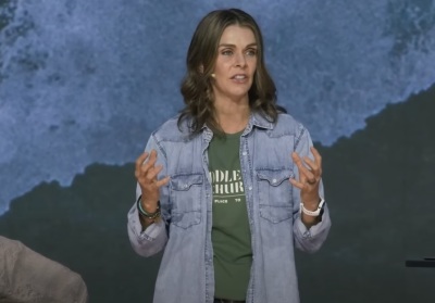 Stacie Wood of Saddleback Church preaching a sermon in October 2022. The church identifies Wood as a 'pastor,' even though the Southern Baptist Convention prohibits female ordination. 