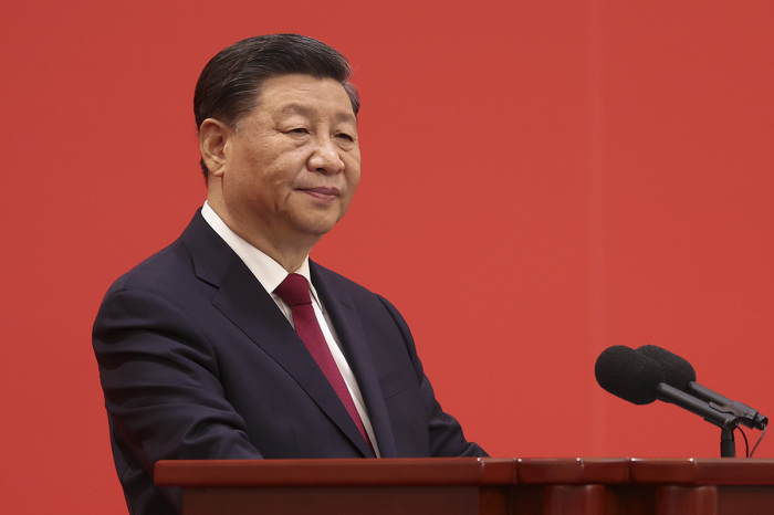 Chinese President Xi Jinping speaks at the podium during the meeting between members of the standing committee of the Political Bureau of the 20th CPC Central Committee and Chinese and foreign journalists at The Great Hall of People on Oct. 23, 2022, in Beijing, China. China's ruling Communist Party today revealed the new Politburo Standing Committee after its 20th congress. 