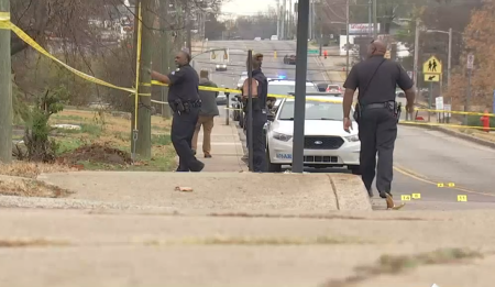 Police officers secure the scene after a drive-by shooting outside the New Season Church in Nashville, Tenn., on Nov. 26, 2022.