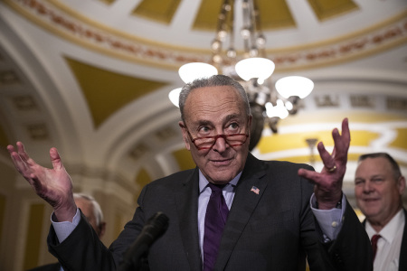 Outgoing Senate Majority Leader Chuck Schumer, D-N.Y., speaks to reporters after meeting with Senate Democrats at the U.S. Capitol Nov. 29, 2022, in Washington, D.C.