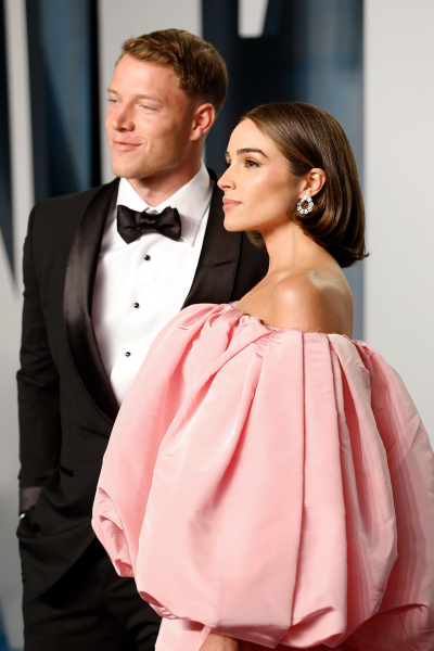 Christian McCaffrey and Olivia Culpo attend the 2022 Vanity Fair Oscar Party hosted by Radhika Jones at Wallis Annenberg Center for the Performing Arts on March 27, 2022, in Beverly Hills, California. 