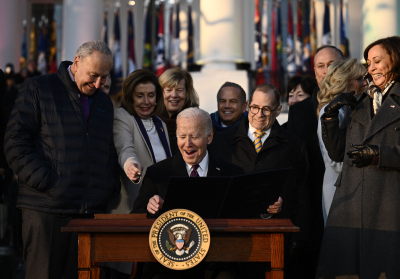 President Joe Biden signs the Respect for Marriage Act on the South Law of the White House in Washington, D.C., on December 13, 2022. The US Congress on December 8, 2022 passed the landmark legislation to protect same-sex marriage under federal law. 