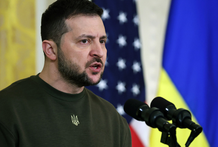 President of Ukraine Volodymyr Zelensky delivers remarks during a joint press conference with U.S. President Joe Biden in the East Room at the White House on Dec. 21, 2022, in Washington, D.C. Zelensky is meeting with President Biden on his first known trip outside of Ukraine since the Russian invasion began, and the two leaders are expected to discuss continuing military aid. Zelensky will reportedly address a joint meeting of Congress in the evening. 