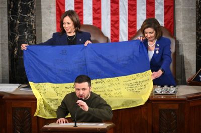 Ukraine's President Volodymyr Zelensky speaks after giving a Ukrainian national flag to U.S. House Speaker Nancy Pelosi, D-Calif., and Vice President Kamala Harris during his address the U.S. Congress at the US Capitol in Washington, D.C. on December 21, 2022.