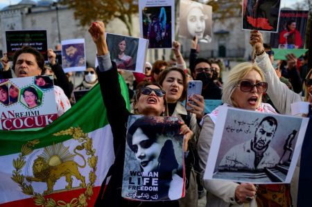 People take part in a rally in support of Iranian women in Istanbul, on November 26, 2022. 