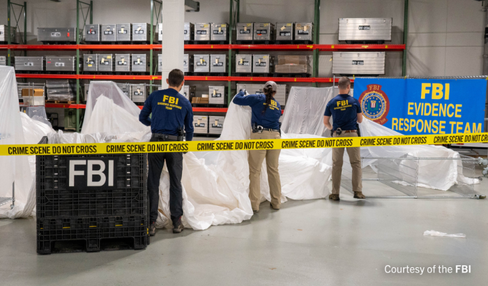 FBI special agents assigned to the Evidence Response Team process material recovered from the high-altitude balloon recovered off the coast of South Carolina. 