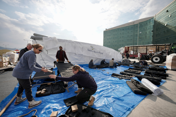 Workers set up a Samaritan's Purse field hospital in Antakya, Turkey, following the 7.8 magnitude earthquake that killed tens of thousands of people in Turkey and Syria. 