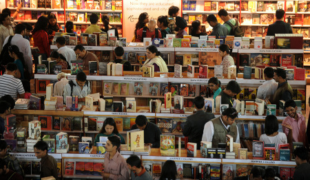 Visitors through books on display on the final day of The World Book Fair in New Delhi. India is the third biggest market for English publications. 