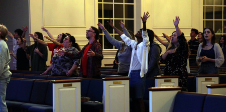 Students taking part in revival worship at the campus of Regent University of Virginia Beach, Virginia, during spring break, 2023. 