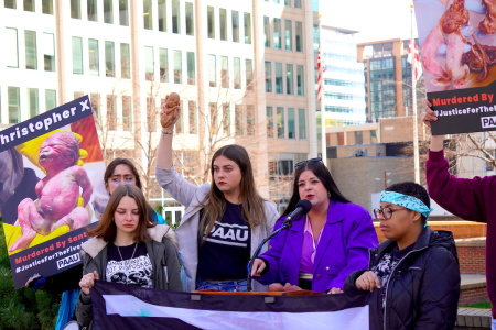 Demonstrators speak at the Progressive Anti-Abortion Uprising's press conference and demonstration outside the D.C. Board of Medicine office in Washington, D.C., on March 21, 2023. PAAU held a weeklong series of events to raise awareness and call for 'justice' about the five dead full-term aborted babies discovered by activists Terrisa Bukovinac and Lauren Handy last March. 