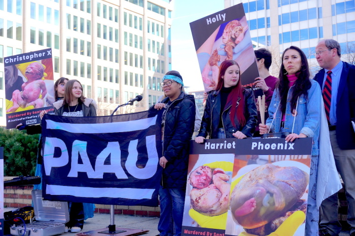 Demonstrators speak at the Progressive Anti-Abortion Uprising's press conference and demonstration outside the D.C. Board of Medicine office in Washington, D.C. on March 21, 2023. PAAU held a weeklong series of events to raise awareness and call for 'justice' about the five dead full-term aborted babies discovered by activists Terrisa Bukovinac and Lauren Handy last March. 