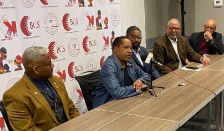 Larry Elder addresses press and fellow keynote speakers attending the Black Conservative Summit in Chicago, Illinois, which was held on March 24-25, 2023. From left to right: Lt. Col Allen West, Larry Elder, filmmaker Chad O Jackson, Ken Blackwell and Bob Woodson.