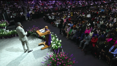 Rev. Solomon W. Kinloch Jr., the senior pastor of Triumph Church in Detroit, Mich., preaches at the Little Caesars Arena in Detroit, Michigan, on Sunday, April 9, 2023.