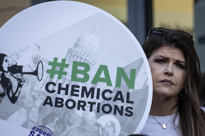 Anti-abortion activists protest against the availability of abortion pills at neighborhood pharmacies outside of a CVS Pharmacy on January 18, 2023, in Washington, D.C. Earlier in February, the Food and Drug Administration (FDA) made a regulatory change that now allows retail pharmacies to offer abortion pills to people who have a prescription. 