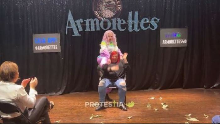 Screenshot of a drag show performance by The Armorettes