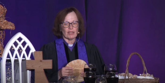 Bishop Debra Wallace-Padgett of The United Methodist Church North Alabama Conference overseeing communion at the Called Annual Conference Session on Dec. 10, 2022. 