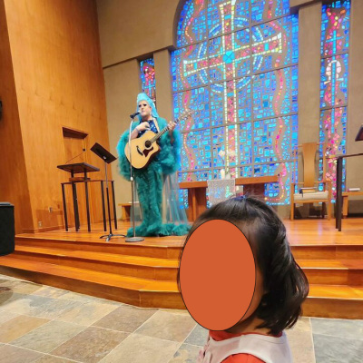 A man dressed as a woman performs in front of children during a service at Calvary Presbyterian Church in San Francisco.