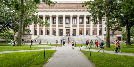 Students walk on the campus of Harvard University in Cambridge, Massachusetts.