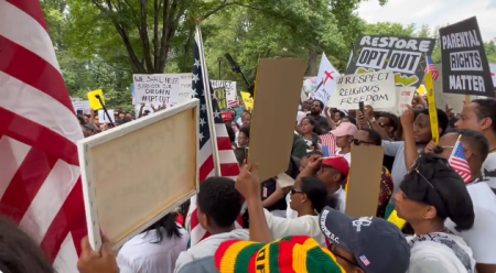 Hundreds of demonstrators gather outside the Montgomery County Public Schools headquarters in Rockville, Maryland, on June 27, 2023.