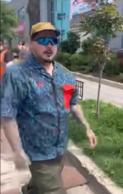 A screenshot of a video showing a man seen assaulting pro-life protesters in Washington, D.C.