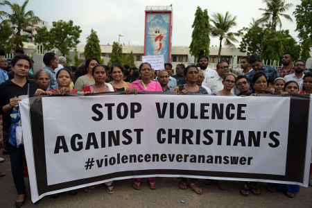 People take part in a protest march against the ongoing ethnic violence in India's northeastern state of Manipur, in Ahmedabad on July 23, 2023. 