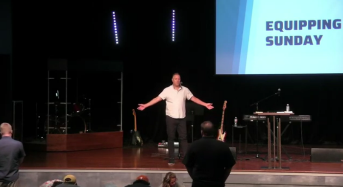 Pastor Tim Darnell preaches during a service at Hill Country Church in San Marcos, Texas, August 27, 2023. 