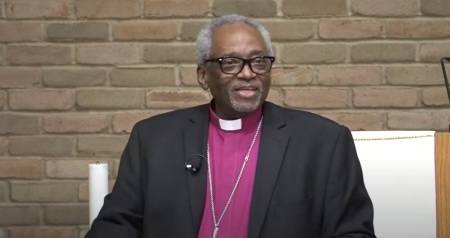 Episcopal Church Presiding Bishop Michael Curry speaking at The Faith & Life Lecture Series at St. Philip the Deacon Lutheran Church of Plymouth, Minnesota, on May 16, 2023. 