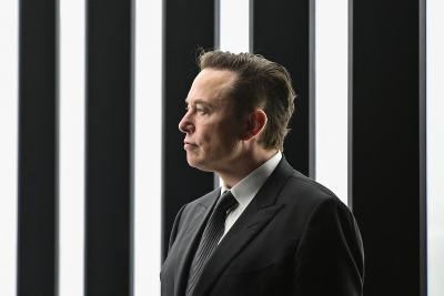 Tesla CEO Elon Musk is pictured as he attends the start of the production at Tesla's 'Gigafactory' on March 22, 2022 in Gruenheide, southeast of Berlin. - US electric car pioneer Tesla received the go-ahead for its 'gigafactory' in Germany on March 4, 2022, paving the way for production to begin shortly after an approval process dogged by delays and setbacks. 