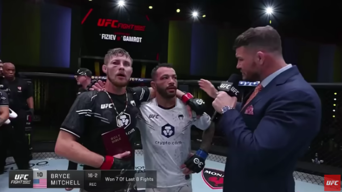 UFC featherweight Bryce Mitchell holding a Bible following a fight at UFC Vegas 79.