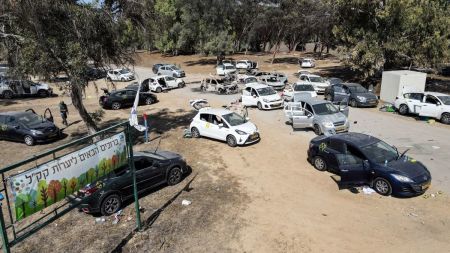 Abandoned and torched vehicles sit at the site of the Oct. 7 attack on the Supernova desert music festival by Palestinian militants near kibbutz Reim in the Negev desert in southern Israel on Oct. 13, 2023. The rave event had drawn thousands of partygoers from Oct. 6 to the desert site close to kibbutz Reim, less than five kilometres (three miles) from the Gaza Strip. But it turned into a horror show early the next day when Hamas militants crossed the border on motorcycles, vans, speed boats or paramotors, launching their surprise offensive on Israel. 