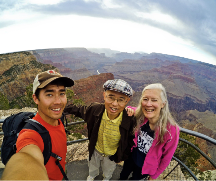 John Chau pictured with his parents