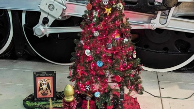 A tree erected at the National Railroad Museum in Green Bay, Wisc., by The Satanic Temple Wisconsin has drawn public outrage, including from Rep. Mike Gallagher.