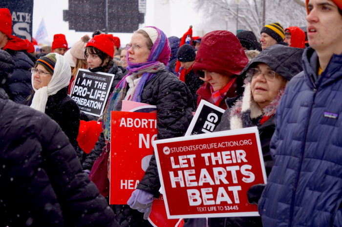 Pro-Life demonstrators endure the snow to march in the streets of Washington, D.C., during the annual March For Life on Jan. 19, 2024.