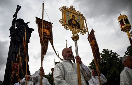 Russian Orthodox clergy participates in a procession and a prayer service marking the 1035th anniversary of the Baptism of Rus, the ancient word for Russia, at the monument to Vladimir the Great near the Kremlin in central Moscow on July 28, 2023. 