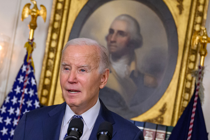 U.S. President Joe Biden answers questions about Israel after speaking about the Special Counsel report in the Diplomatic Reception Room of the White House in Washington, D.C., on February 8, 2024, in a surprise last-minute addition to his schedule for the day. A long-awaited report cleared President Joe Biden of any wrongdoing in his mishandling of classified documents from his tenure in the Senate and as vice president on February 8 but dropped a political bombshell by painting the Democrat as a 'well-meaning, elderly man with a poor memory.' 