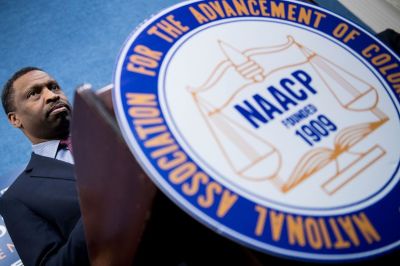 Derrick Johnson, president and CEO of the NAACP, pauses while speaking during a press conference on March 28, 2018 in Washington, D.C.