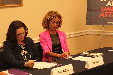 Cady Mullens (L) becomes emotional during a roundtable discussion in Washington, D.C., on March 12, 2024. 