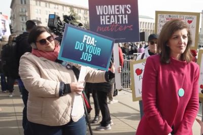 Catherine Herring (R) speaks with the Media outside the U.S. Supreme Court on March 26, 2024.