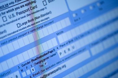 A partially completed passport application, with an X gender marker, is seen on a computer monitor in Alexandria, Virginia, on April 11, 2022. A small extra box to tick on an application form that a non-binary person who on Monday became one of the first Americans to apply for a gender-neutral passport. The option to receive a passport with an 'X' gender designation that was made available Monday by Joe Biden's administration. 