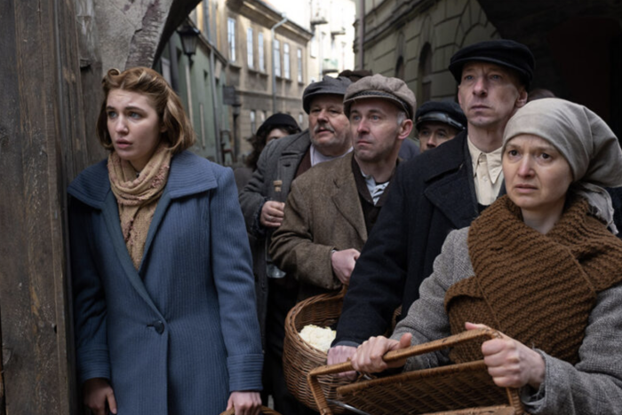 Sophie Nélisse as Irene Gut Opdyke, left, stars in a scene from the movie “Irena's Vow.” 