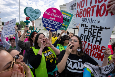 Abortion rights and pro-life supporters clash outside the Supreme Court on April 24, 2024, in Washington, D.C. The Supreme Court hears oral arguments today on Moyle v. United States and Idaho v. United States to decide if Idaho emergency rooms can provide abortions to pregnant women during an emergency using a federal law known as the Emergency Medical Treatment and Labor Act to supersede a state law that criminalizes most abortions in Idaho.