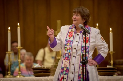 United Methodist Church Bishop Karen Oliveto preaches a sermon at First United Methodist Church of Charlotte, North Carolina, on April 28, 2024, during the UMC General Conference. Oliveto's election was ruled invalid by the United Methodist Judicial Council in 2017 due to her being in a same-sex marriage. However, she has remained a bishop of the UMC Mountain Sky Episcopal Area. 