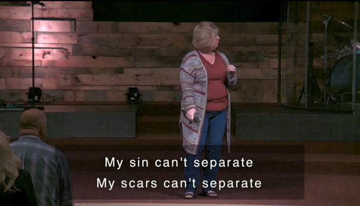 Pastor Ken Barner's wife, Rhonda, stopped singing a moment after the lights came back on following a blackout at Crossroads Ministries in Finleyville, Pennsylvania, as an F1 tornado hit the church on May 11, 2024. 