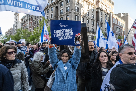 Israel supporters, including Christian Evangelicals, participate in the United for Israel march outside of Columbia University on April 25, 2024, in New York City. 