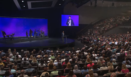 Gateway Church Elder Tra Willbanks addresses congregants on Sunday June 23, 2024.