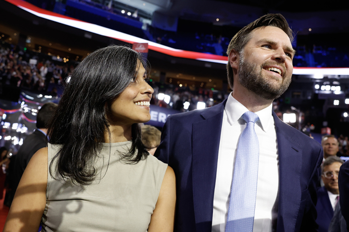 Sen. J.D. Vance, R-Ohio, and his wife, Usha Chilukuri Vance, look on as he is nominated for the office of vice president on the first day of the Republican National Convention at the Fiserv Forum on July 15, 2024, in Milwaukee, Wisconsin. Delegates, politicians, and the Republican faithful are in Milwaukee for the annual convention, concluding with former President Donald Trump accepting his party's presidential nomination. The RNC takes place from July 15-18. 