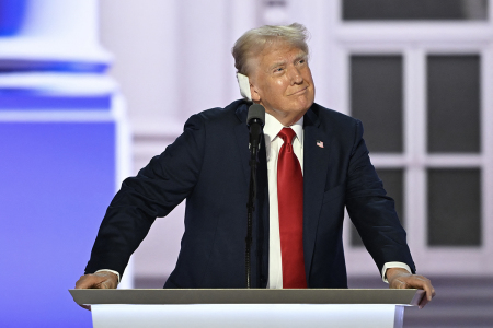 Former President and 2024 Republican presidential candidate Donald Trump arrives onstage to accept his party's nomination on the last day of the 2024 Republican National Convention at the Fiserv Forum in Milwaukee, Wisconsin, on July 18, 2024. Days after he survived an assassination attempt Trump won formal nomination as the Republican presidential candidate and picked Ohio U.S. Sen. J.D. Vance for his running mate. 