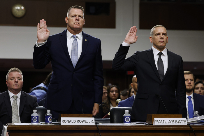 Acting U.S. Secret Service Director Ronald Rowe Jr. (L) and Deputy Federal Bureau of Investigation Director Paul Abbate are sworn in before testifying to a joint hearing of the Senate Judiciary and Homeland Security and Government Affairs committees in the Dirksen Senate Office Building on Capitol Hill on July 30, 2024, in Washington, D.C.