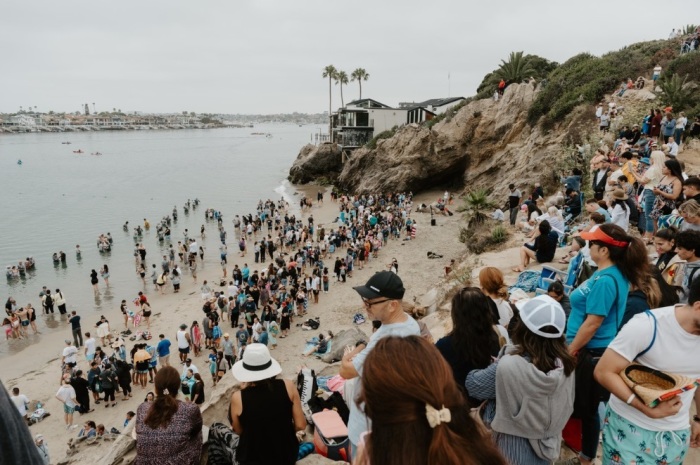 People are being baptized at the second annual Jesus Revolution Baptism at Pirate's Cove Beach in Corona Del Mar, California, on Saturday, July 27, 2024. 